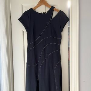 Navy Eshatki dress made by Zapelle with stitching.